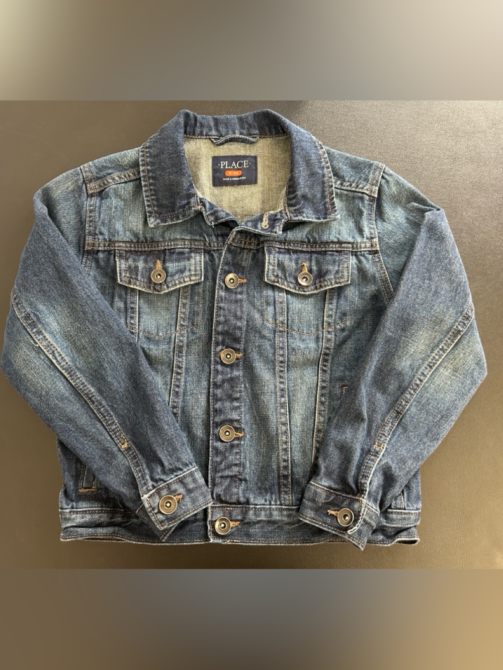 The children’s place size M 7/8 dark wash denim jacket